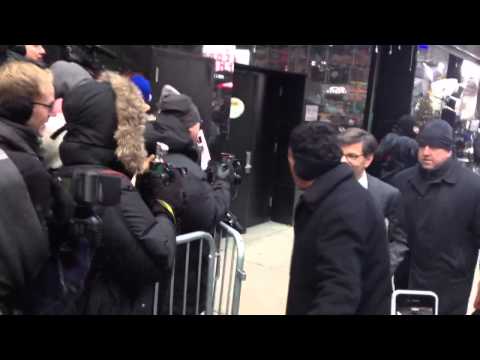 Anchor George Stephanopoulos giving a fist bump while leaving GMA studio in New York