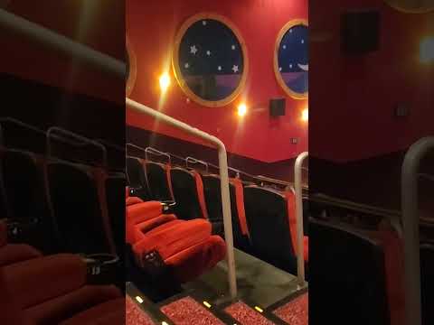 Edwards Regal Stadium Cinema theater has circle shaped windows like a Submarine Irvine CA 4/15/2023