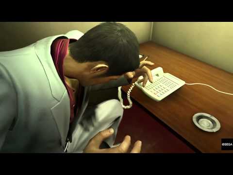 Kazuma Kiryu answers a telephone