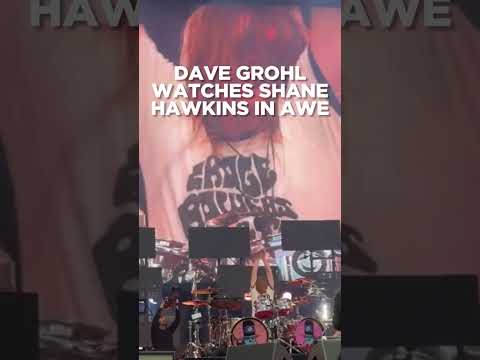 Dave Grohl watches Shane Hawkins play drums in awe